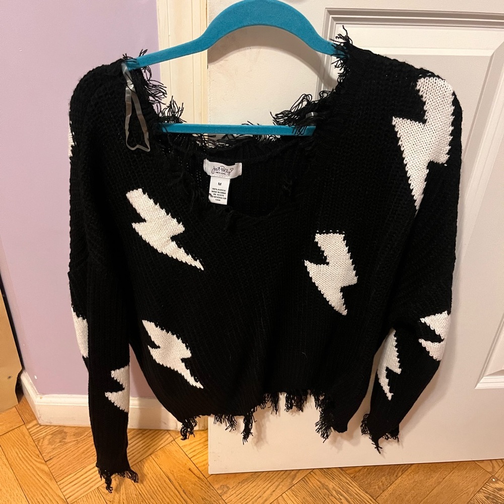 Black and white cropped lightning sweater
